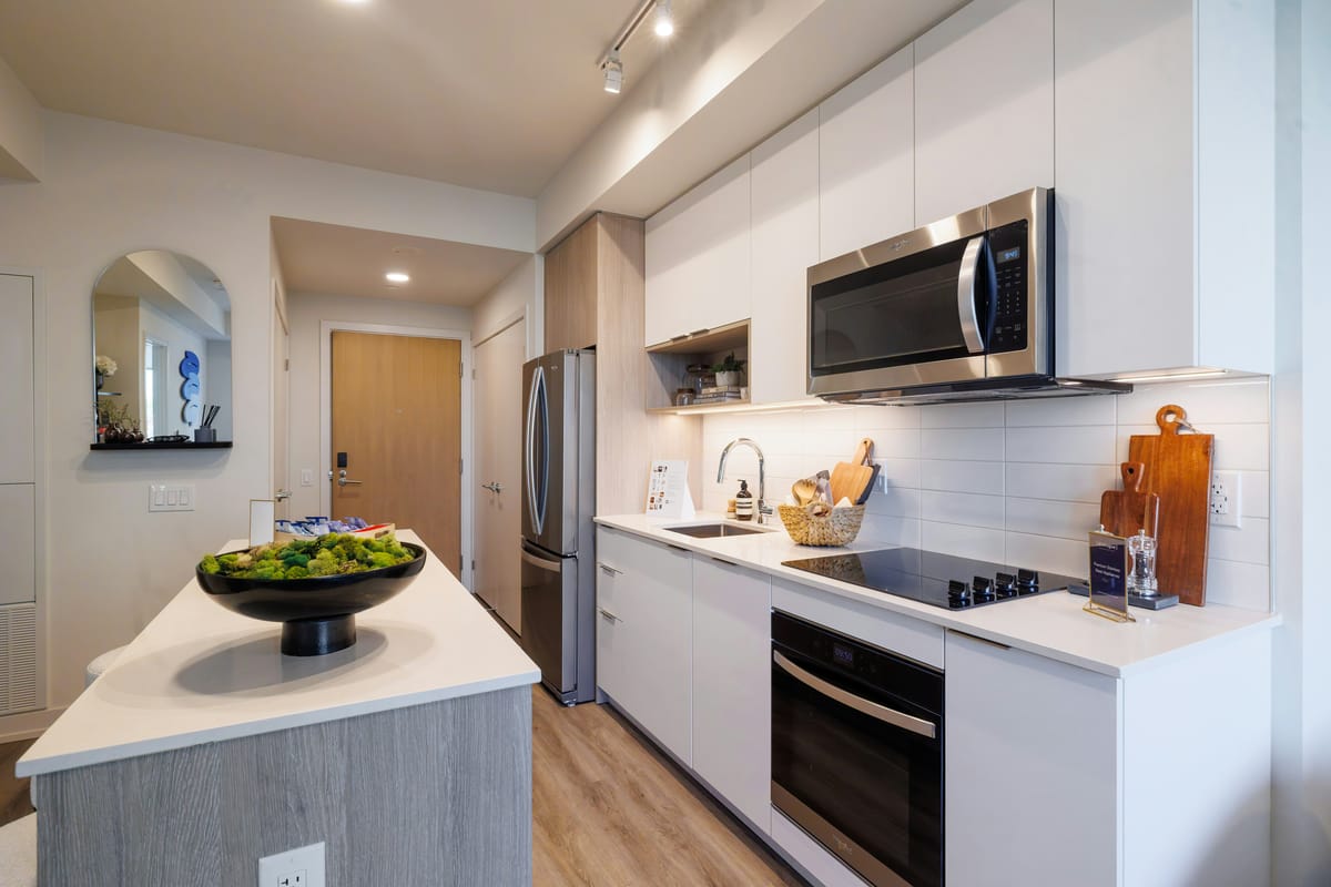 An electrified kitchen with an induction cooktop.