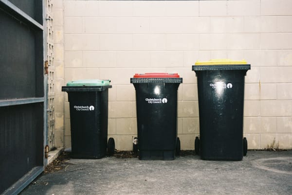 Three Christchurch City Council waste collection bins.